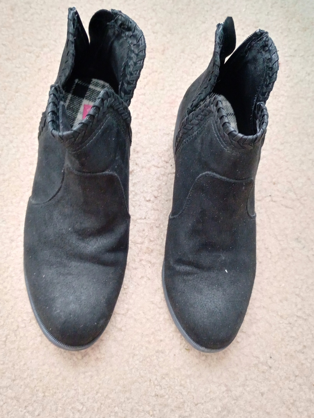 Rock & Candy Lydia ankle boots,  a distinct braided ankle trim and a back zipper